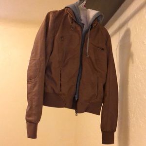 Tan leather jacket with connected grey hoodie